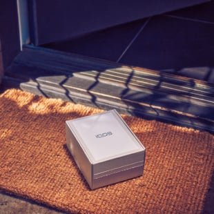IQOS box on a carpet