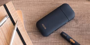 black iqos 2.4 plus wood desk