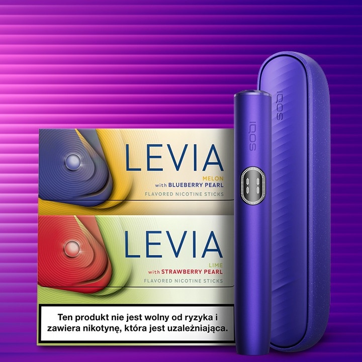 Podgrzewacz tytoniu IQOS ILIMA i obok Paczek LEVIA Melon with blueberry pearl i LEVIA  Lime with strawberry pearl