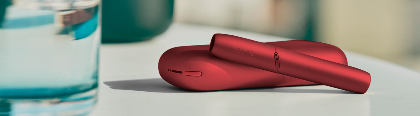 IQOS 3 DUO Radiant Red Limited Edition on desk
